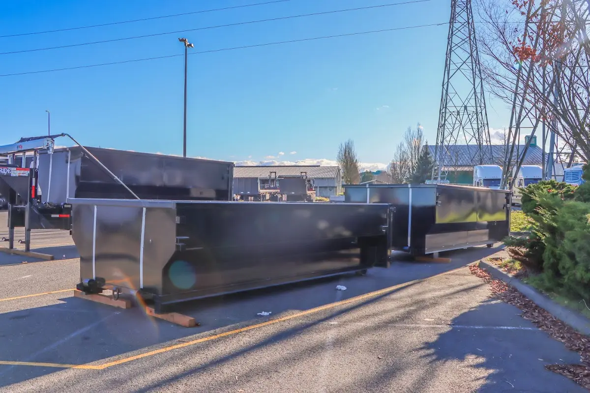 Roll-off dumpster ready for waste disposal at job site for 4 Yard Dumpster Rental in Monroe